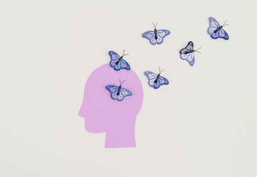 animation of butterflies flying out of a human head depicting thought